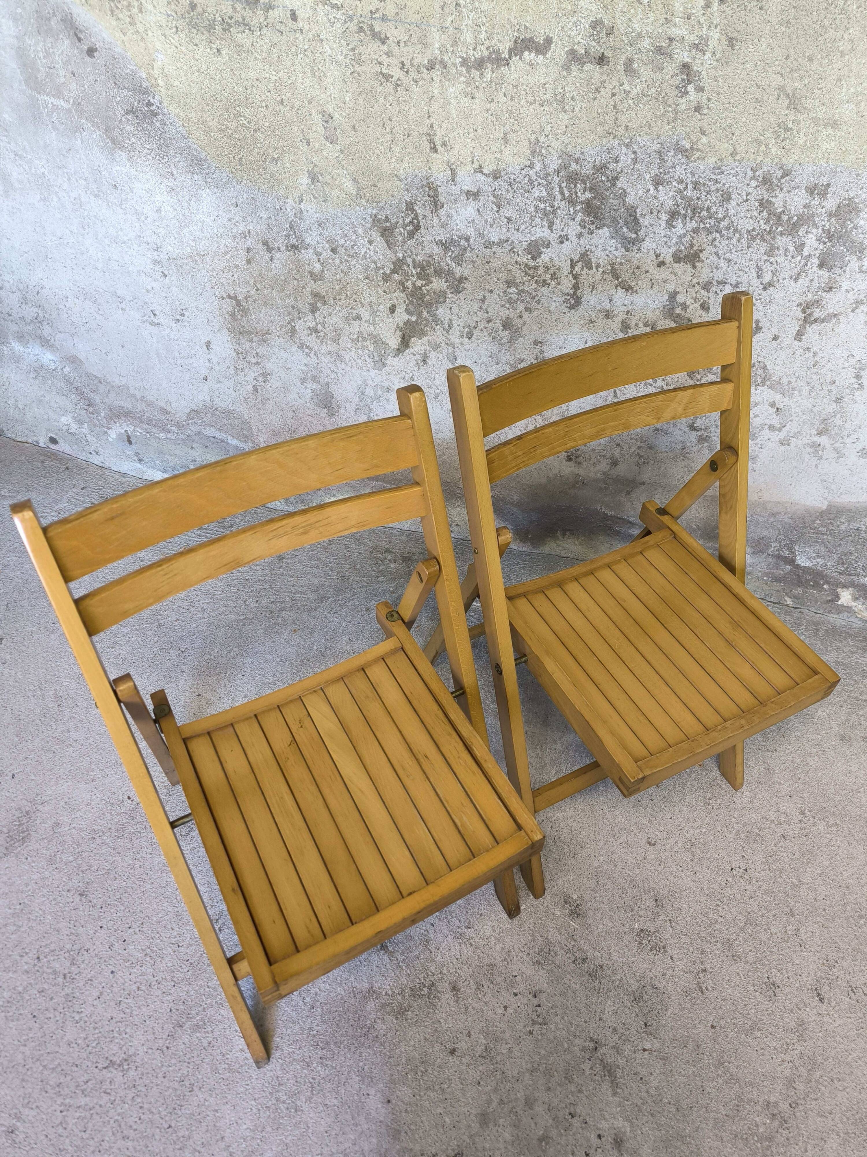 Pair of vintage folding wooden chairs