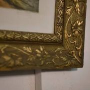 Lithograph of a woodland path, gilt frame, with embossed foliage decoration, 1950s