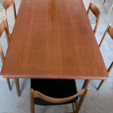 Table with two extensions and its 6 chairs scandinavian teak of the 1970s