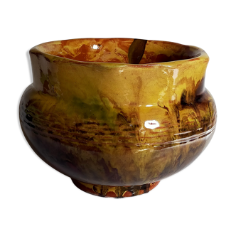 Old provencal pot cover in glazed terracotta