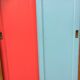 Vintage oak compass foot cabinet with 2 sliding doors painted red and blue