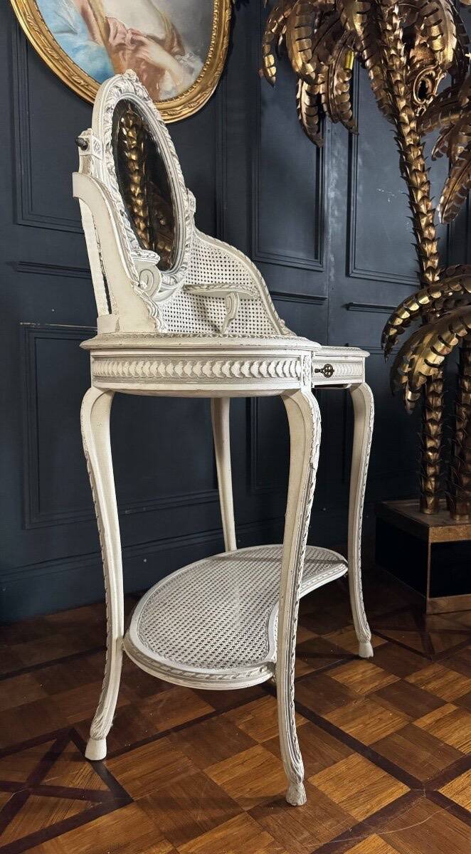 Coiffeuse du XIXe en bois peint et cannage de style Louis XVI