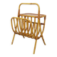 Side table with vintage rattan and wood magazine rack from the 60s