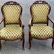 2 Louis XV cabriolet armchairs in wood and embroidered golden fabric.