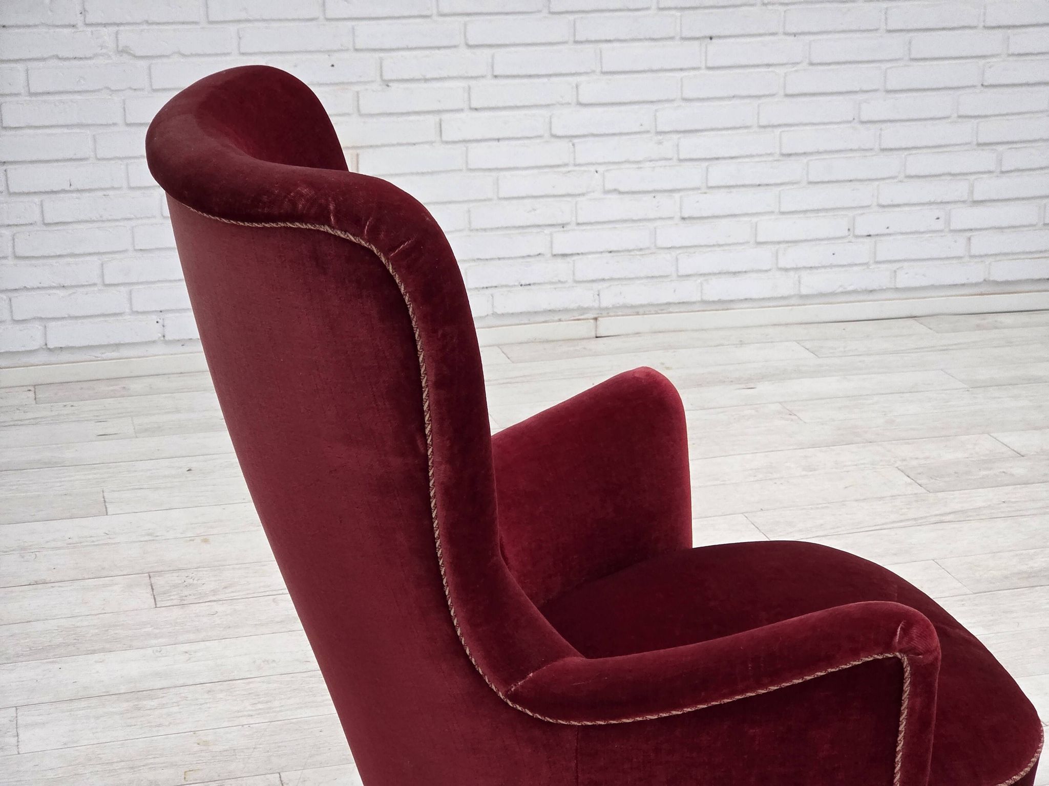 1970s, Danish armchair, cherry-red furniture velour, ash wood legs.