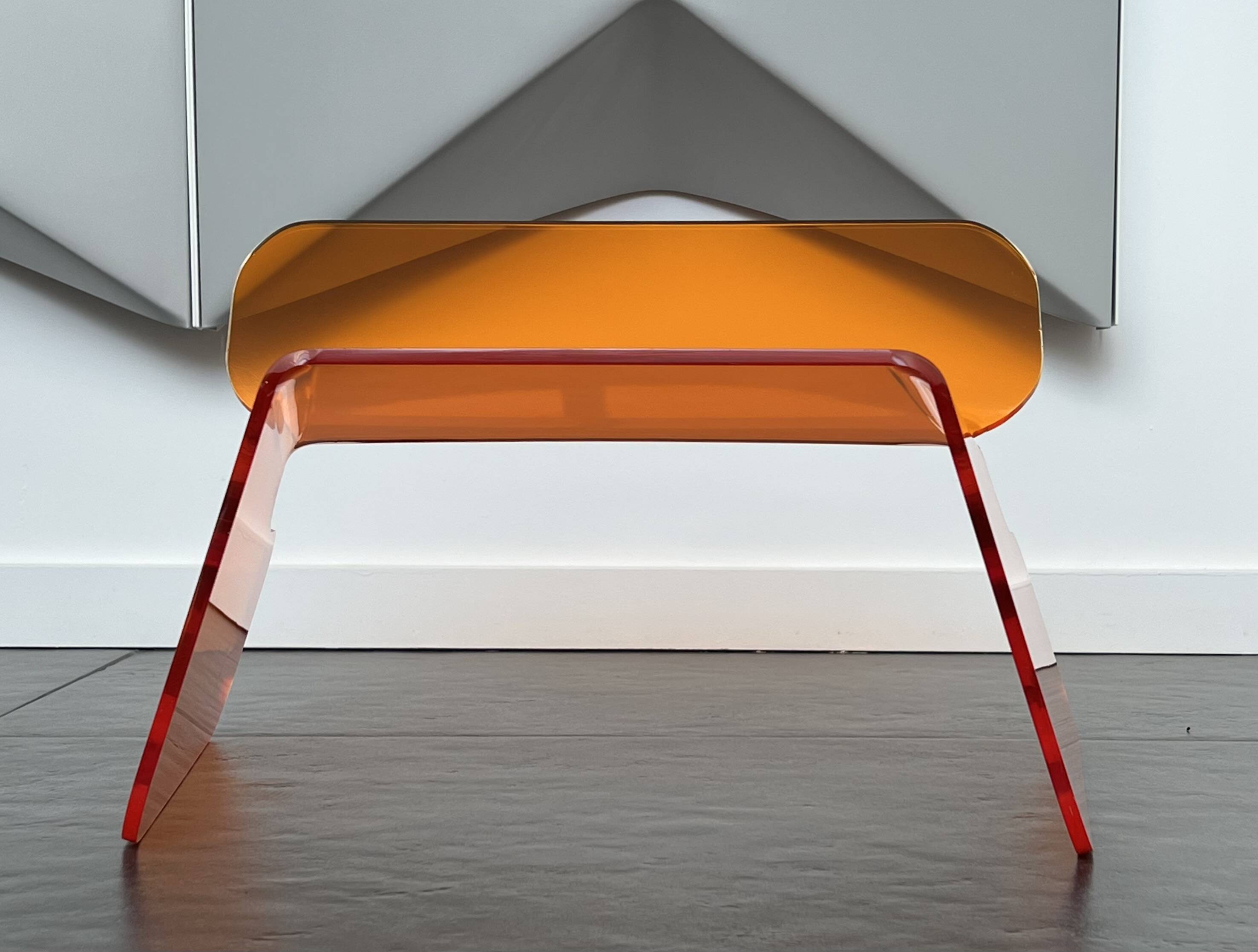 Orange plexiglass chair, 1970s France.
