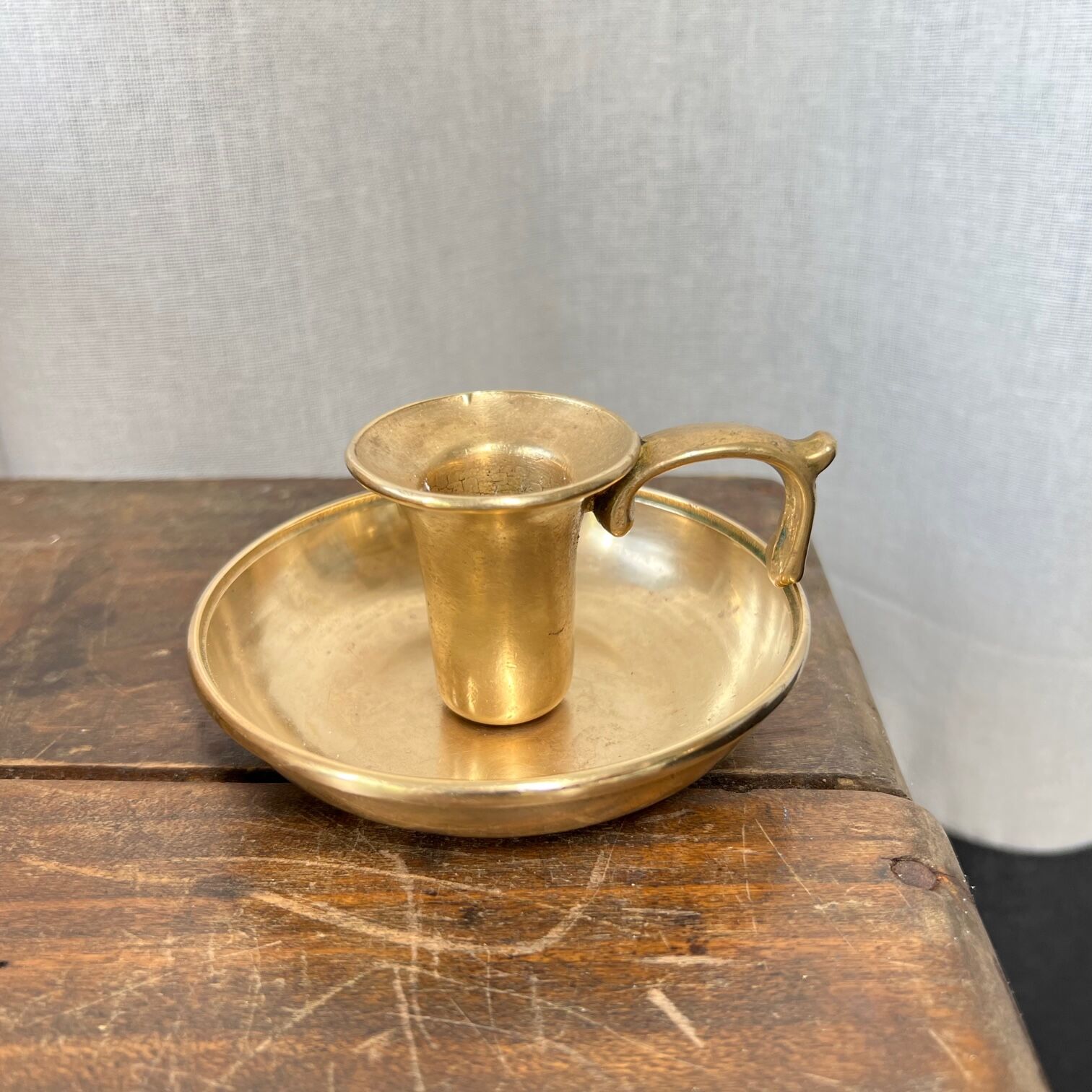 Brass cellar rat candle holder