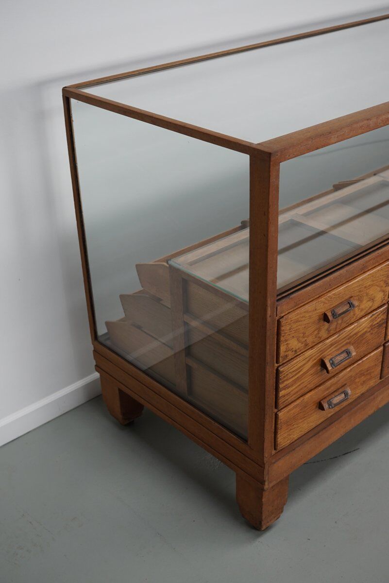 Antique British oak haberdashery cabinet, 1930s