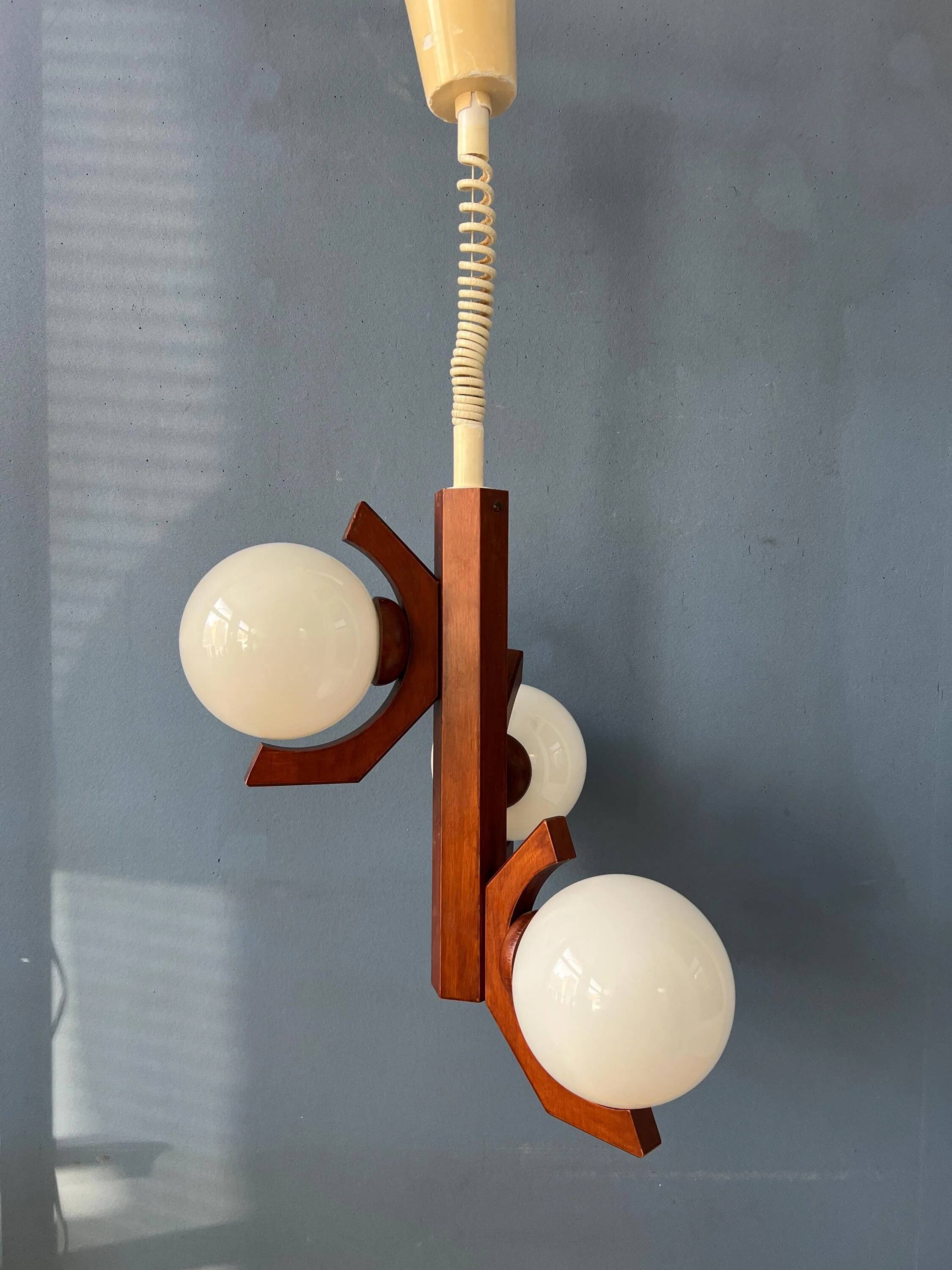 Mid-century brown Bony suspension with opaline glass shade.