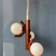 Mid-century brown Bony suspension with opaline glass shade.