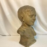 Bust of a young boy, plaster, monogrammed, circa 1900