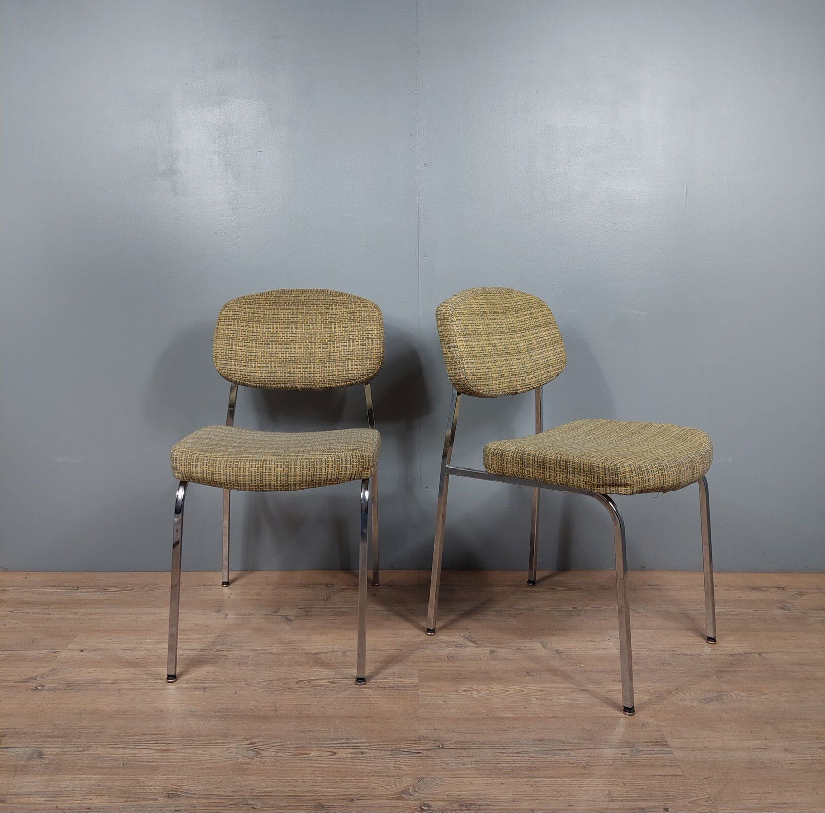 Pair of vintage chairs in fabrics and metal