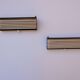 Pair of modernist metal wall light model 212, by Jacques Biny for Luminalite