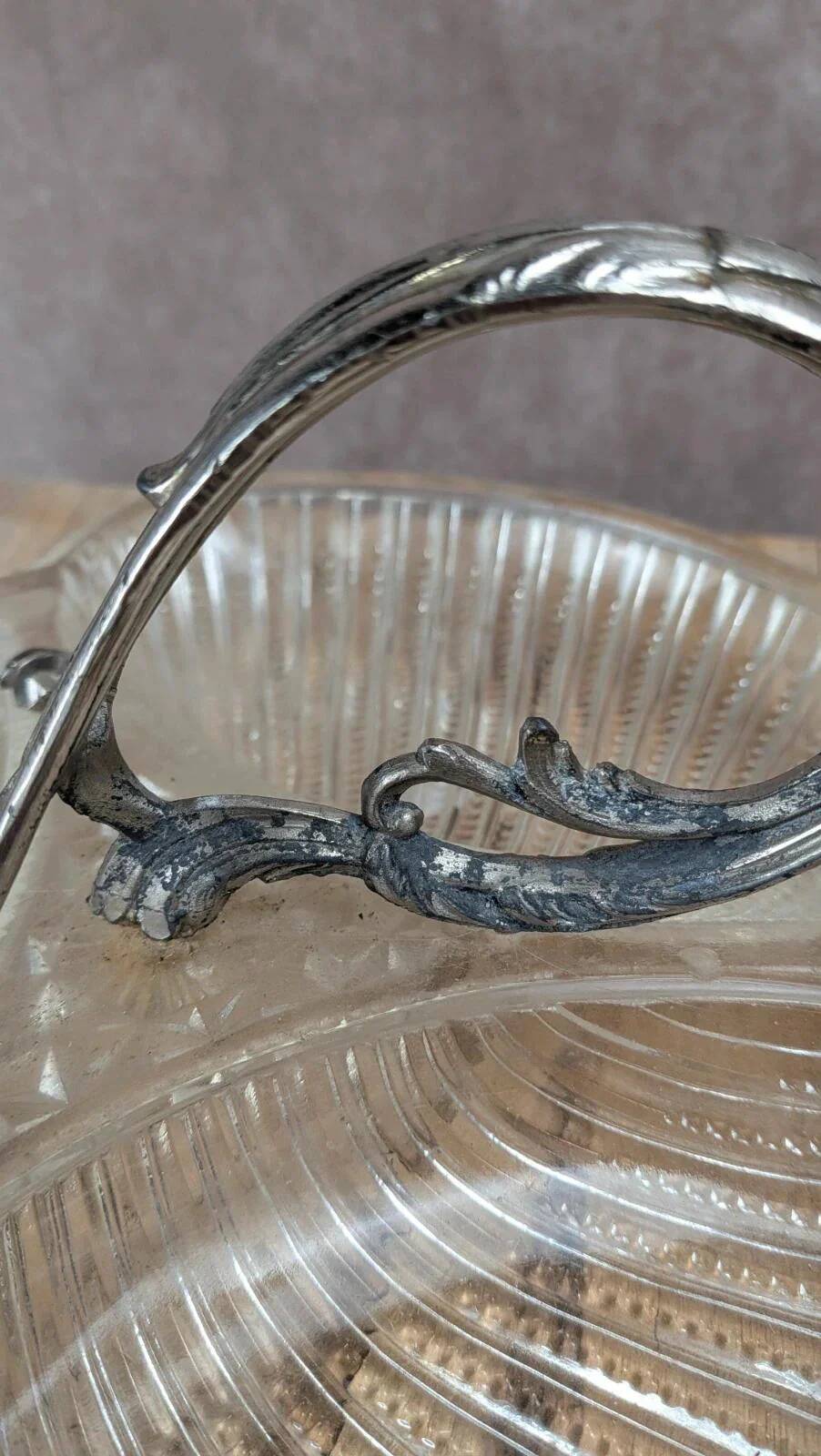 Vintage glass serving tray with silver-plated handle.