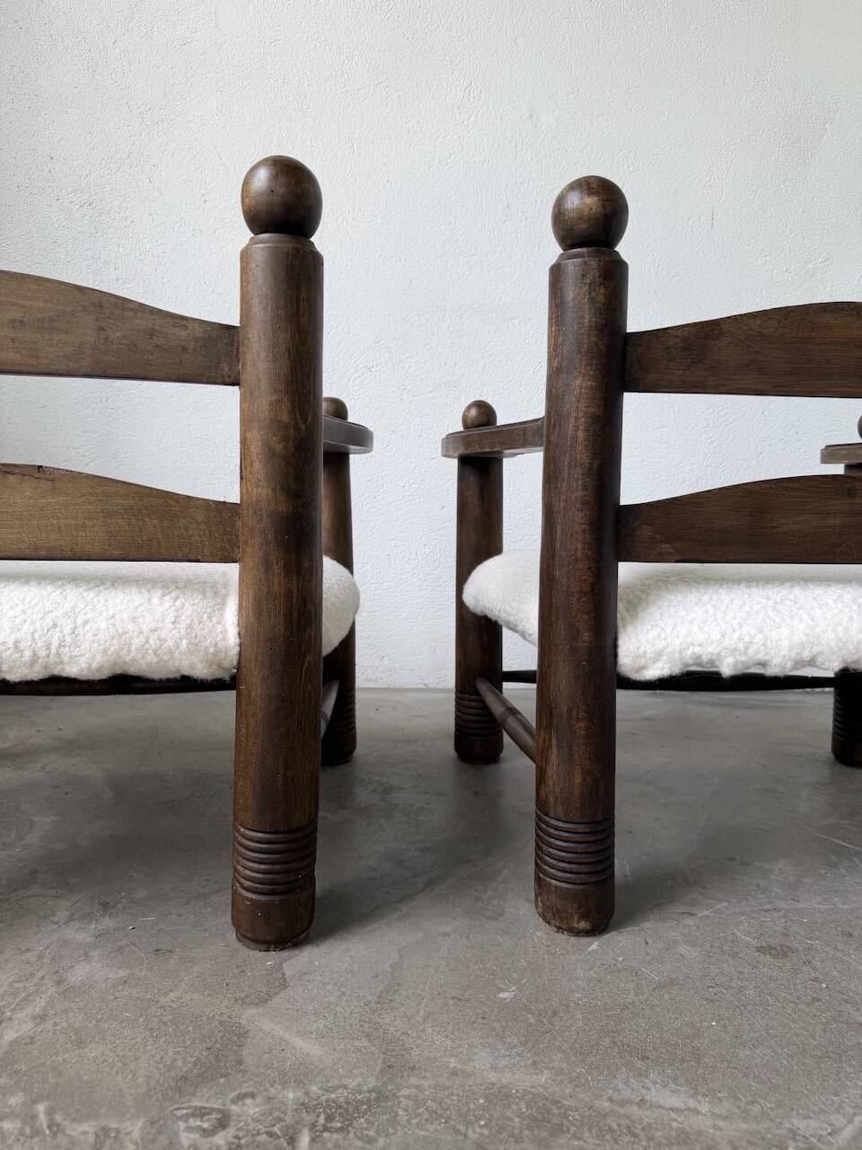 Pair of Dudouyt armchairs from the 1950s, oak.