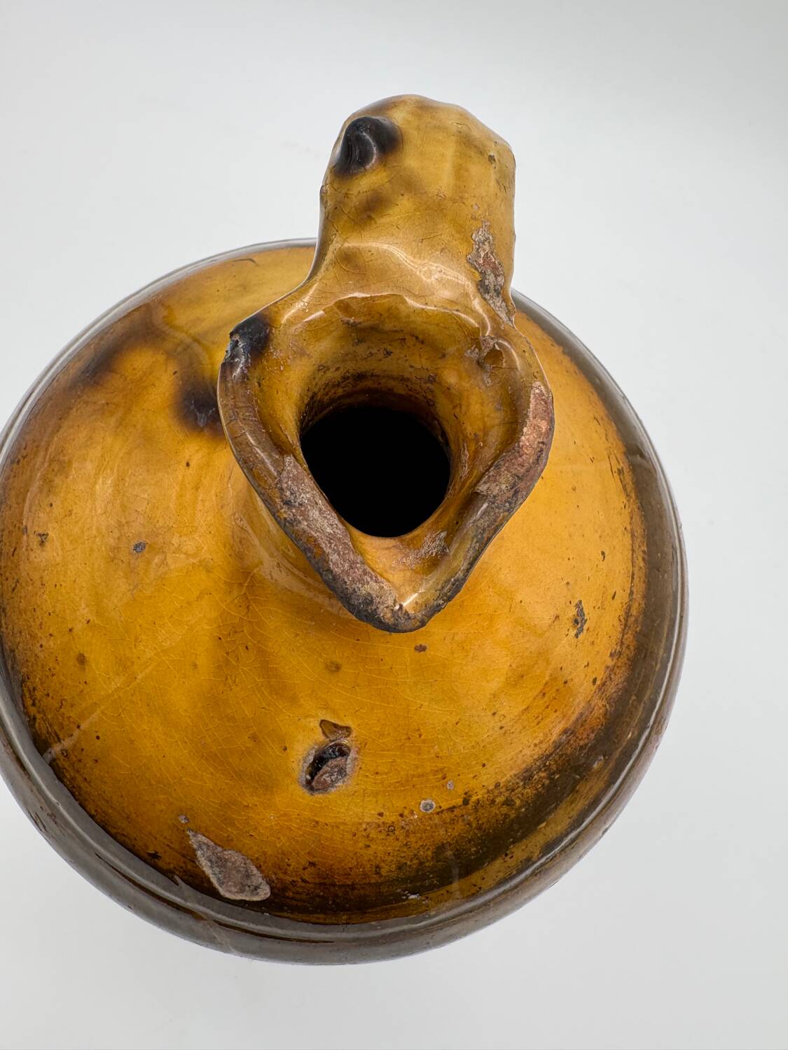 Yellow glazed terracotta pitcher, Spain, 19th century