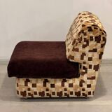 Vintage armchair from the 70s in beige and brown.