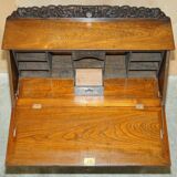 Chinese hand-carved desk from around 1940 with matching chair.