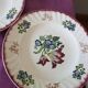 Set of 5 flat plates, signed Longwy.