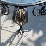 Wrought iron and glass round table