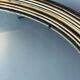Large gold oval wall mirror