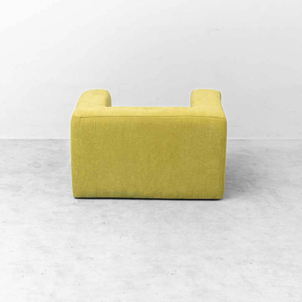 Vintage lounge armchair in lime green fabric – geometric design from the 1970s