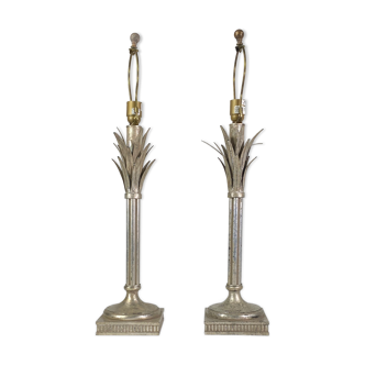 pair of silver metal palm lamp bases