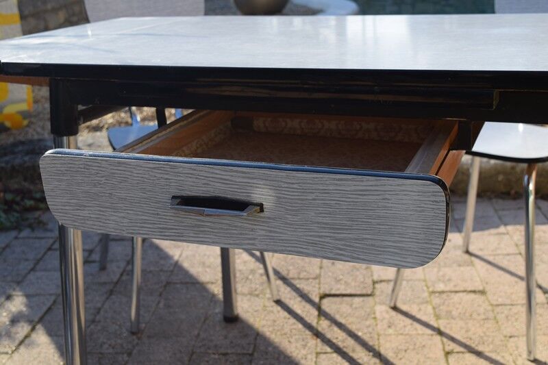 Set of table and four chairs formica