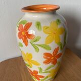 White vase with flowers