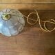 Suspension nacre et laiton