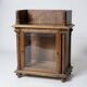 Glass-fronted walnut shelf