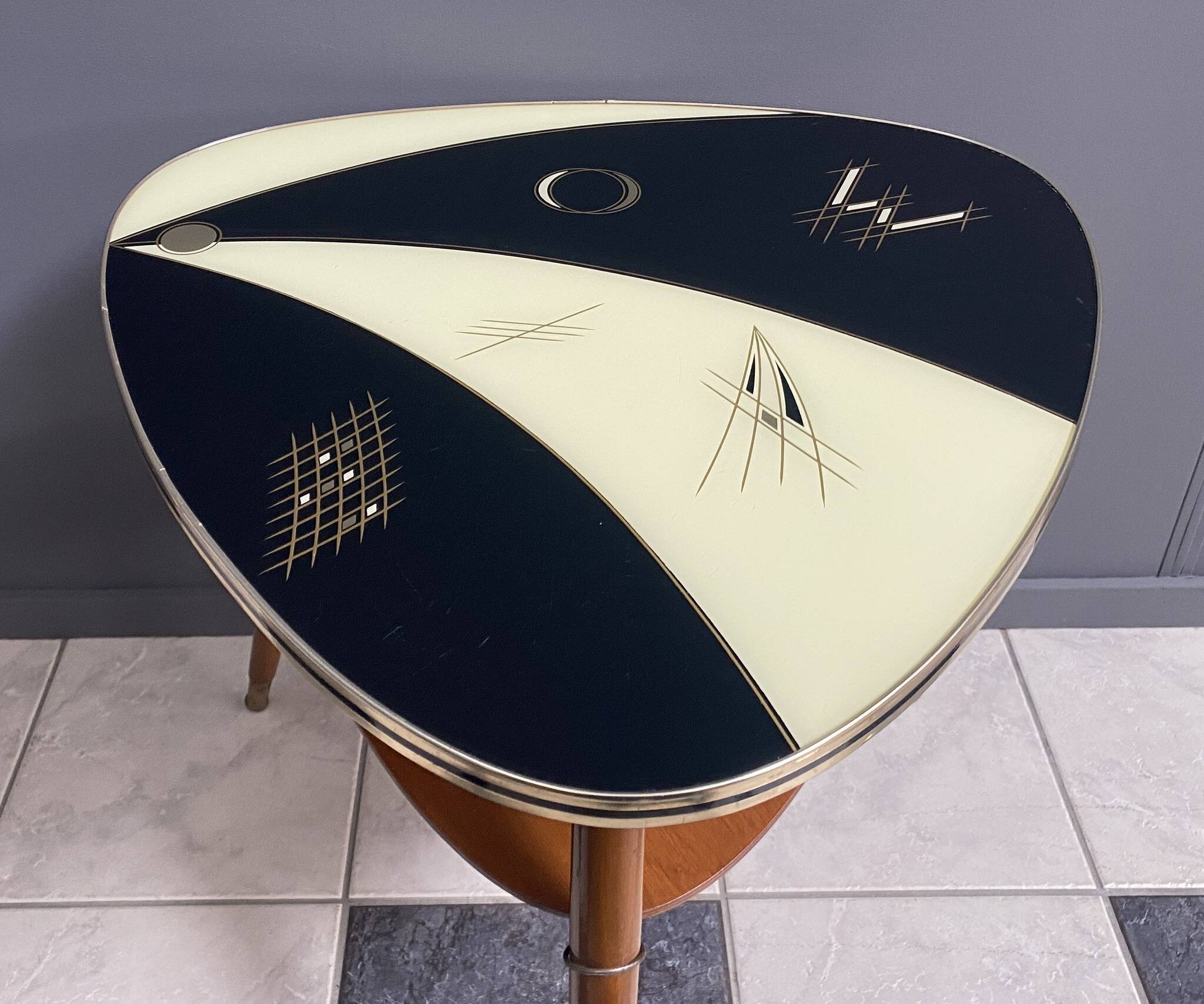 Triangular glass table from the 1960s