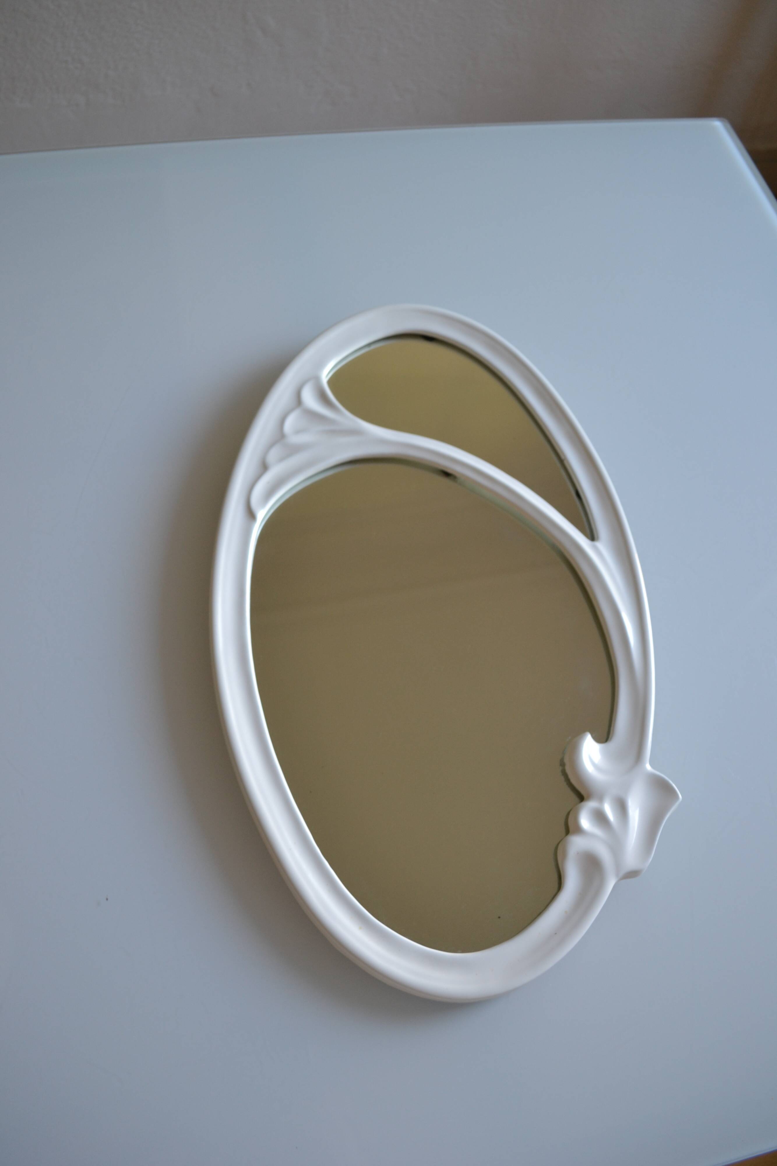 Oval mirror in art nouveau jugendstil style in enamelled cast iron 49 x 29