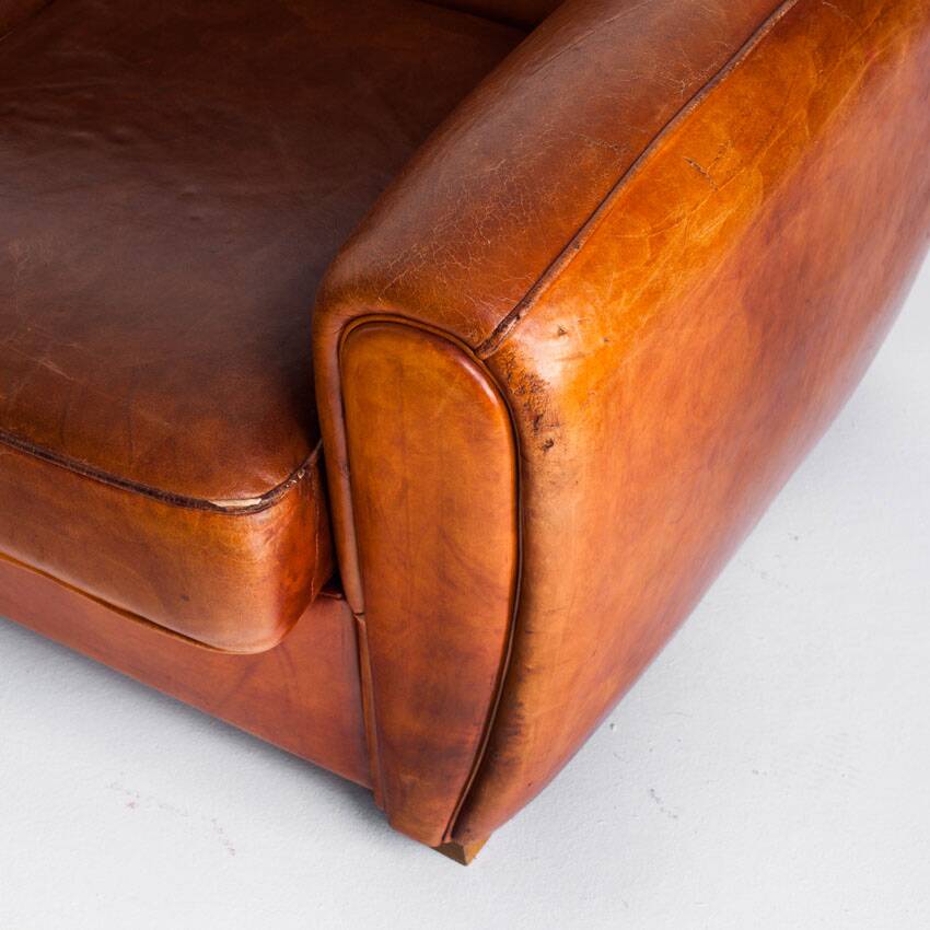Vintage leather club sofa. Art Deco style. France, 1950s. (sofa convertible into bed)