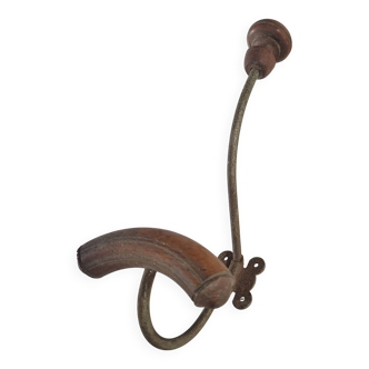 Vintage 1960s wall coat rack in wood and metal.