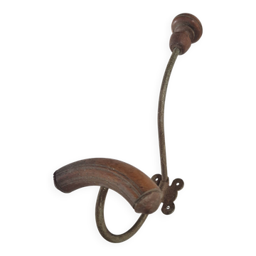 Vintage 1960s wall coat rack in wood and metal.
