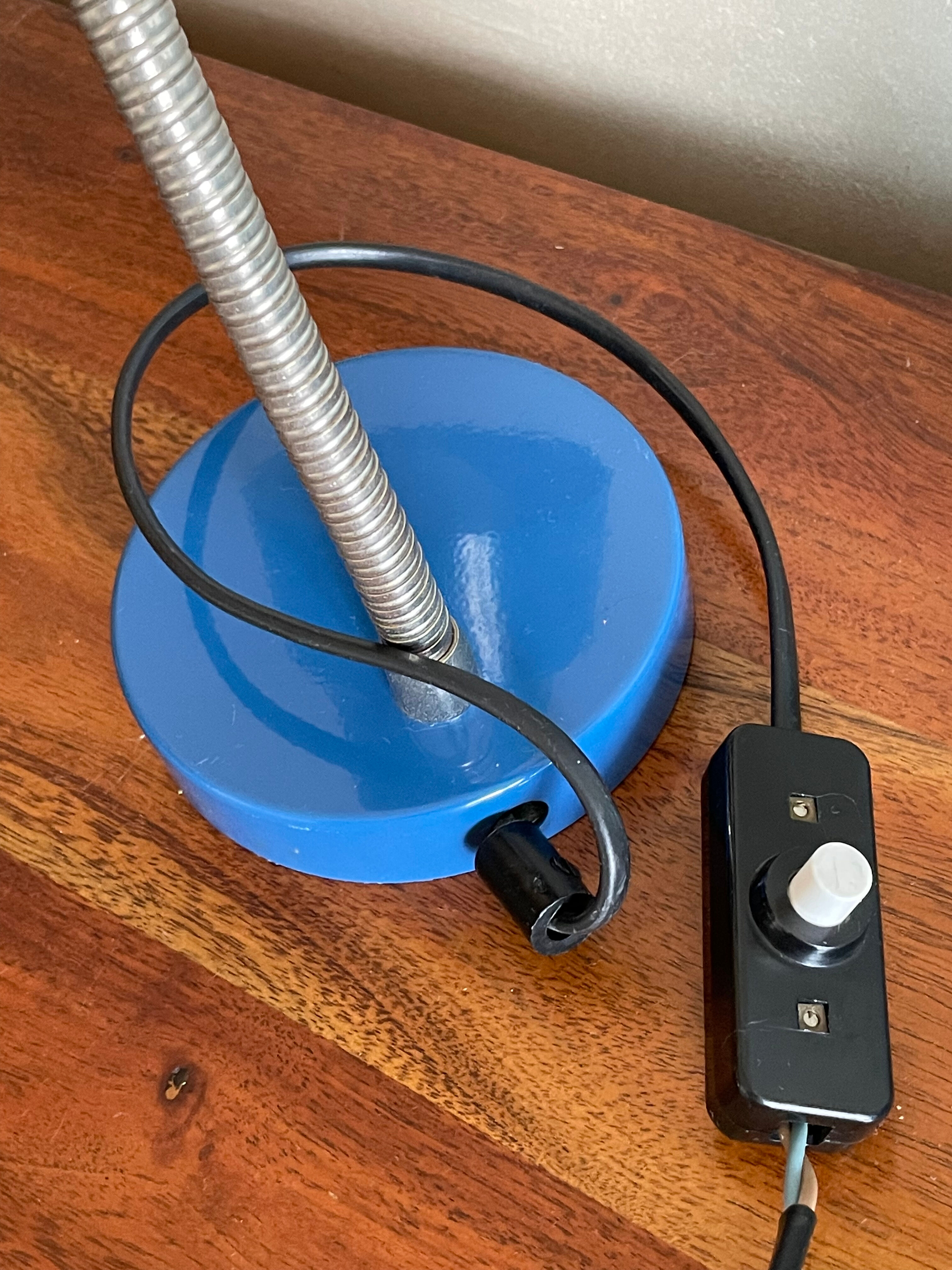 Articulated aluminum lamp of duck blue office