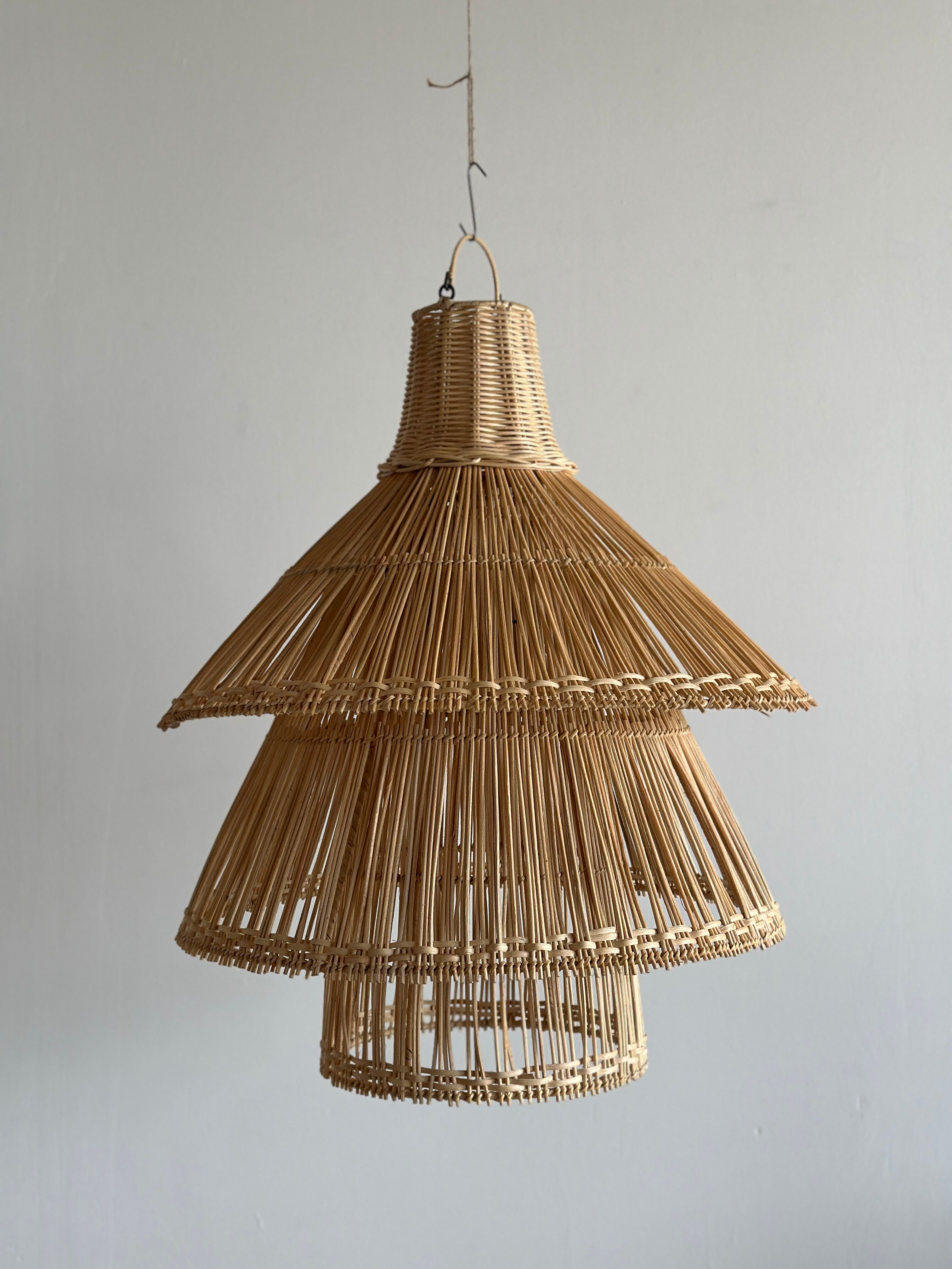 Rattan pendant lamp or light in the shape of an Asian lantern