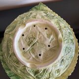 Cherry-decorated drainer fruit cup with its leaf-shaped dish