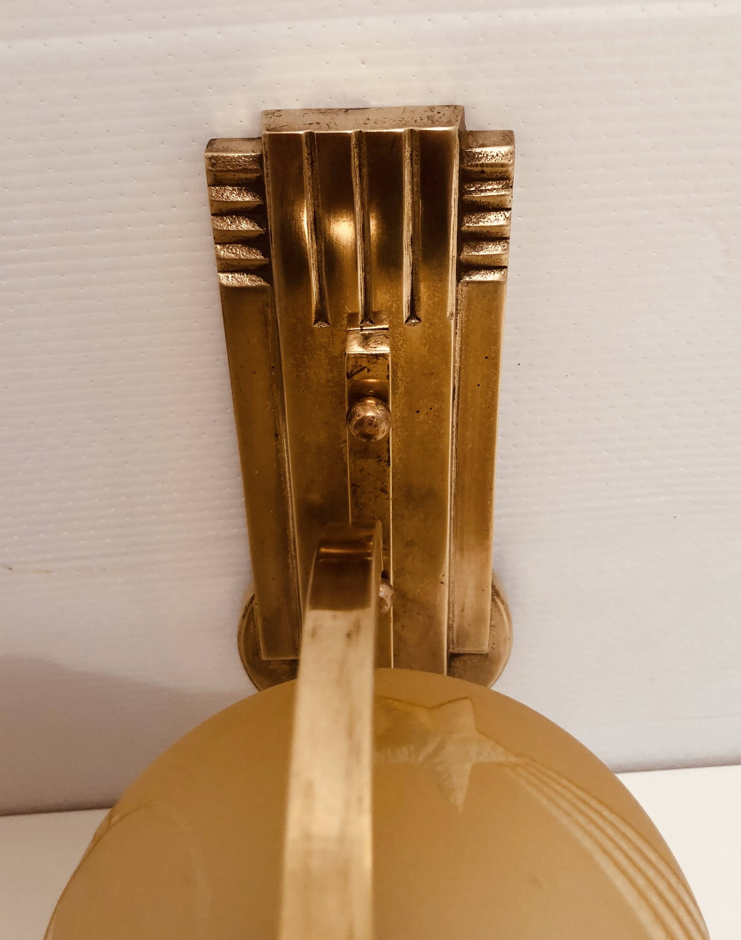 Art Deco wall light 1930-40 signed Deveau brass and glass engraved with stars and planets motif
