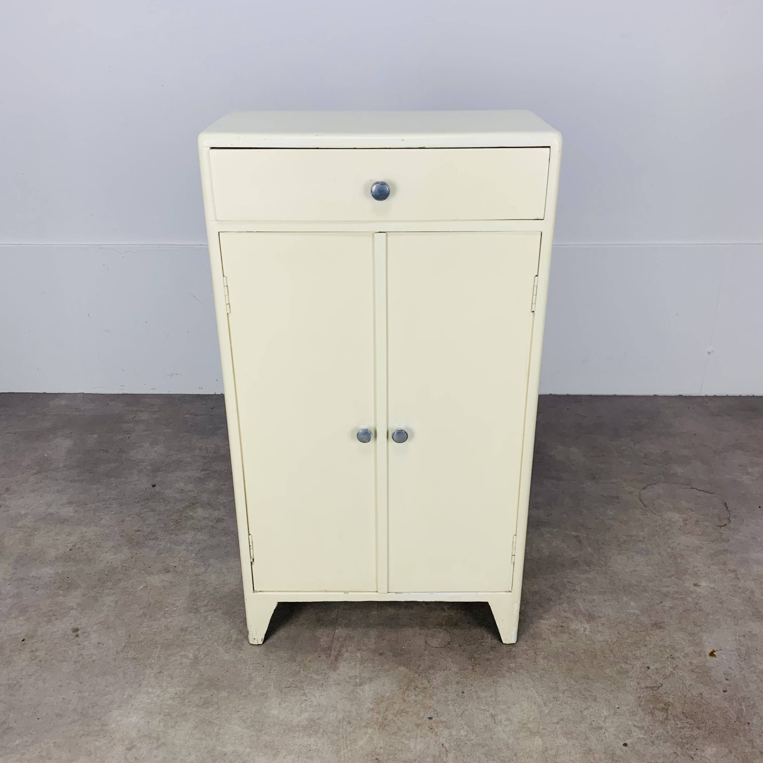 White wood convenient storage unit from the 1950s