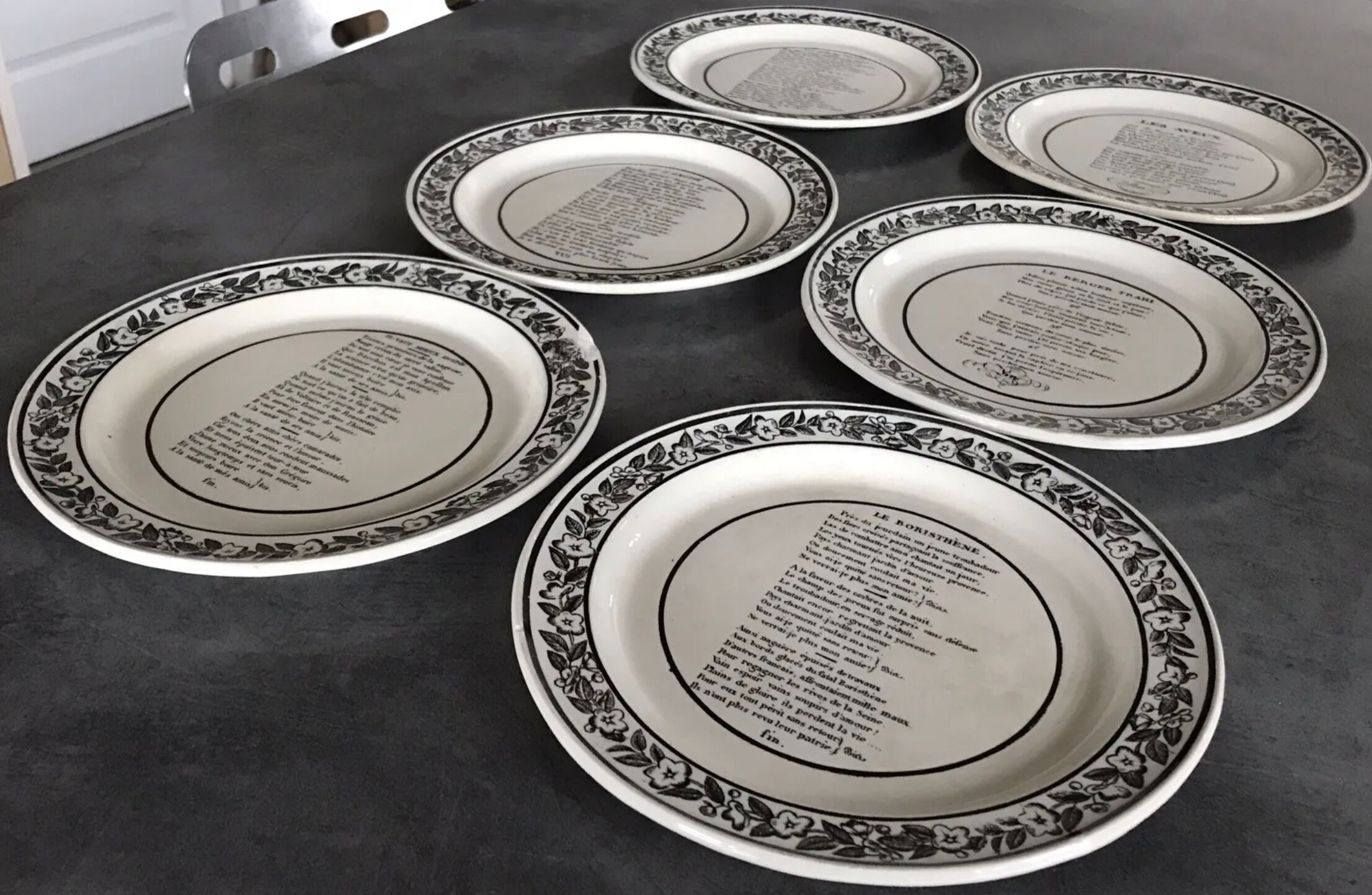 Set of 6 antique plates in fine earthenware with printed decoration of grisailles and poems