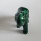 Small emerald green ceramic elephant.