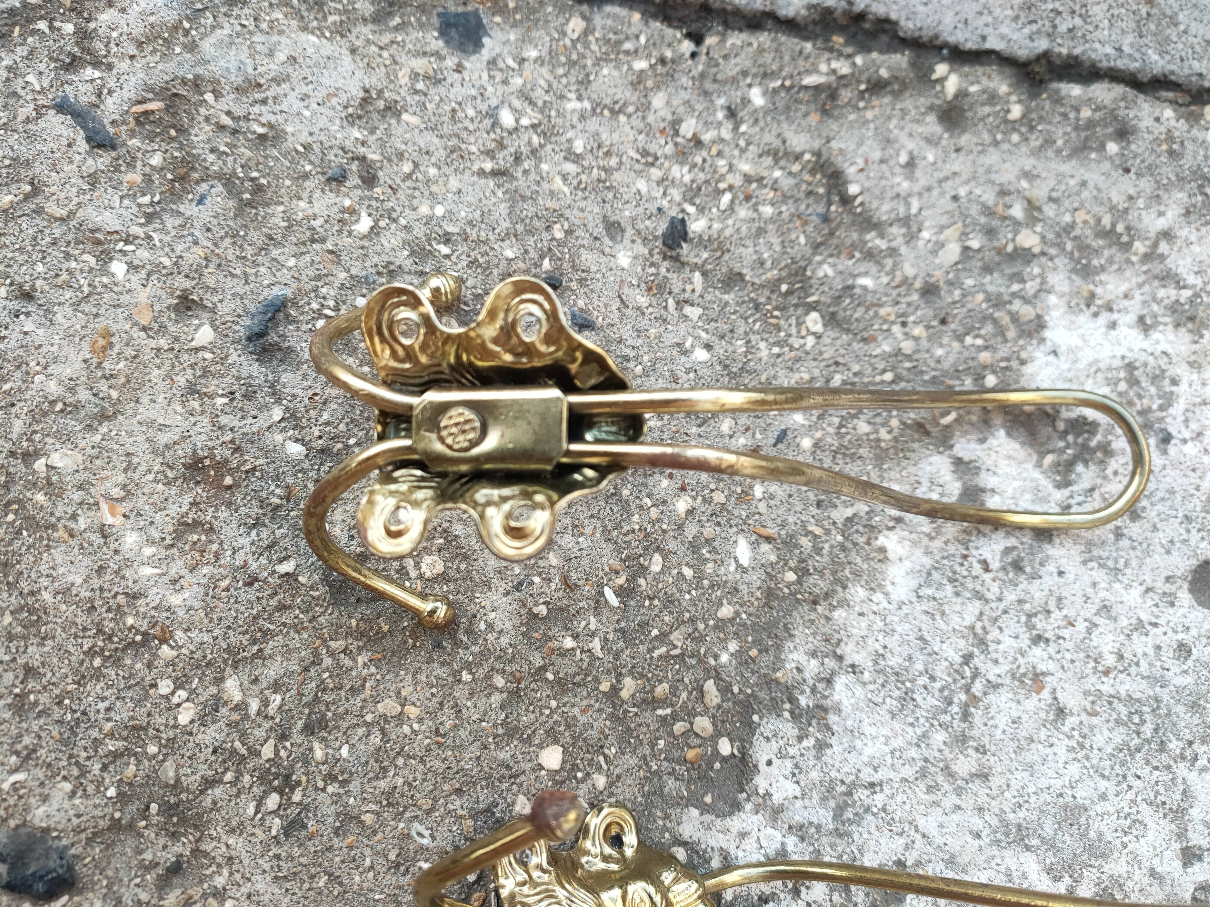 set of 5 antique gold metal hooks