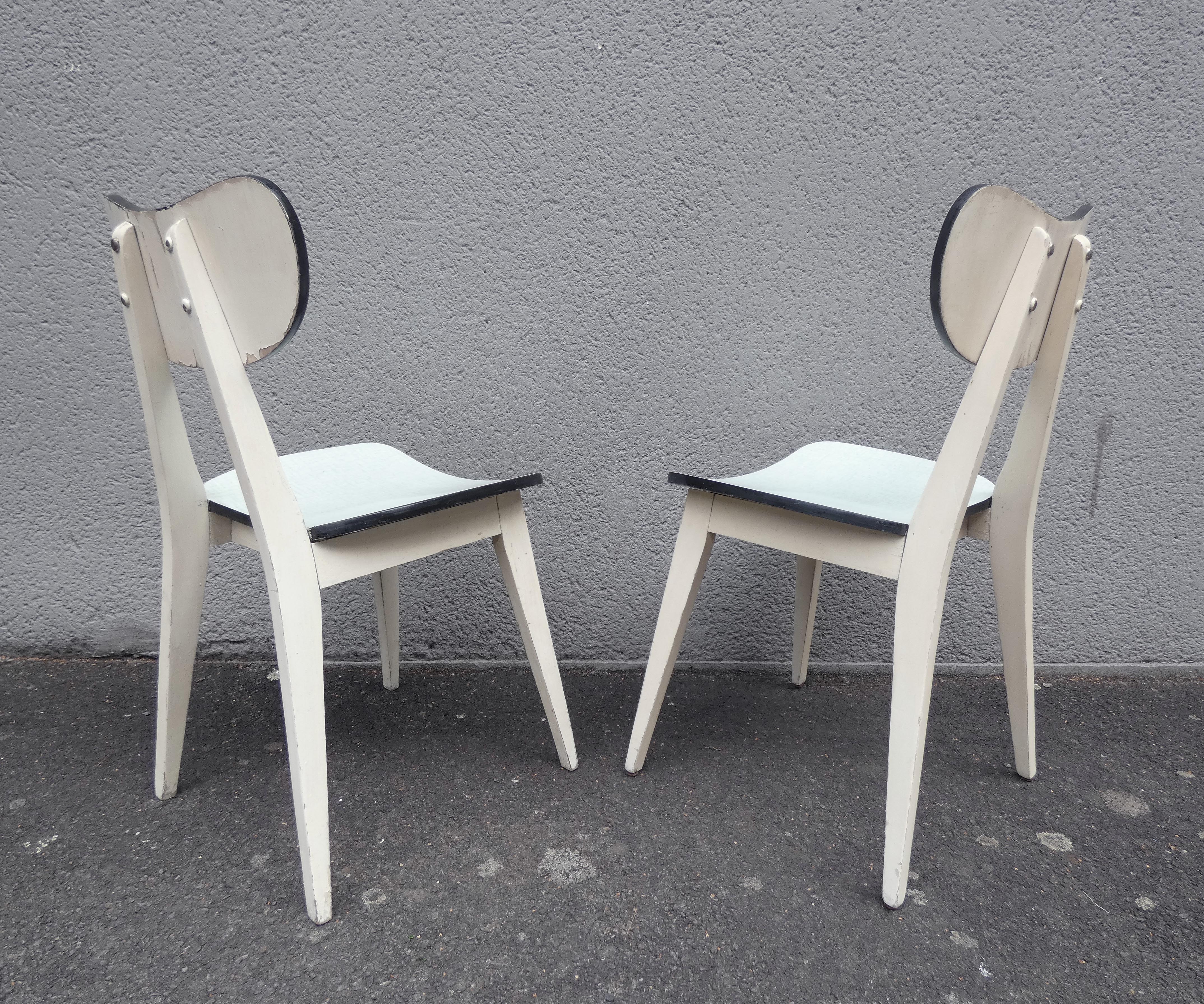 2 chairs in water green formica