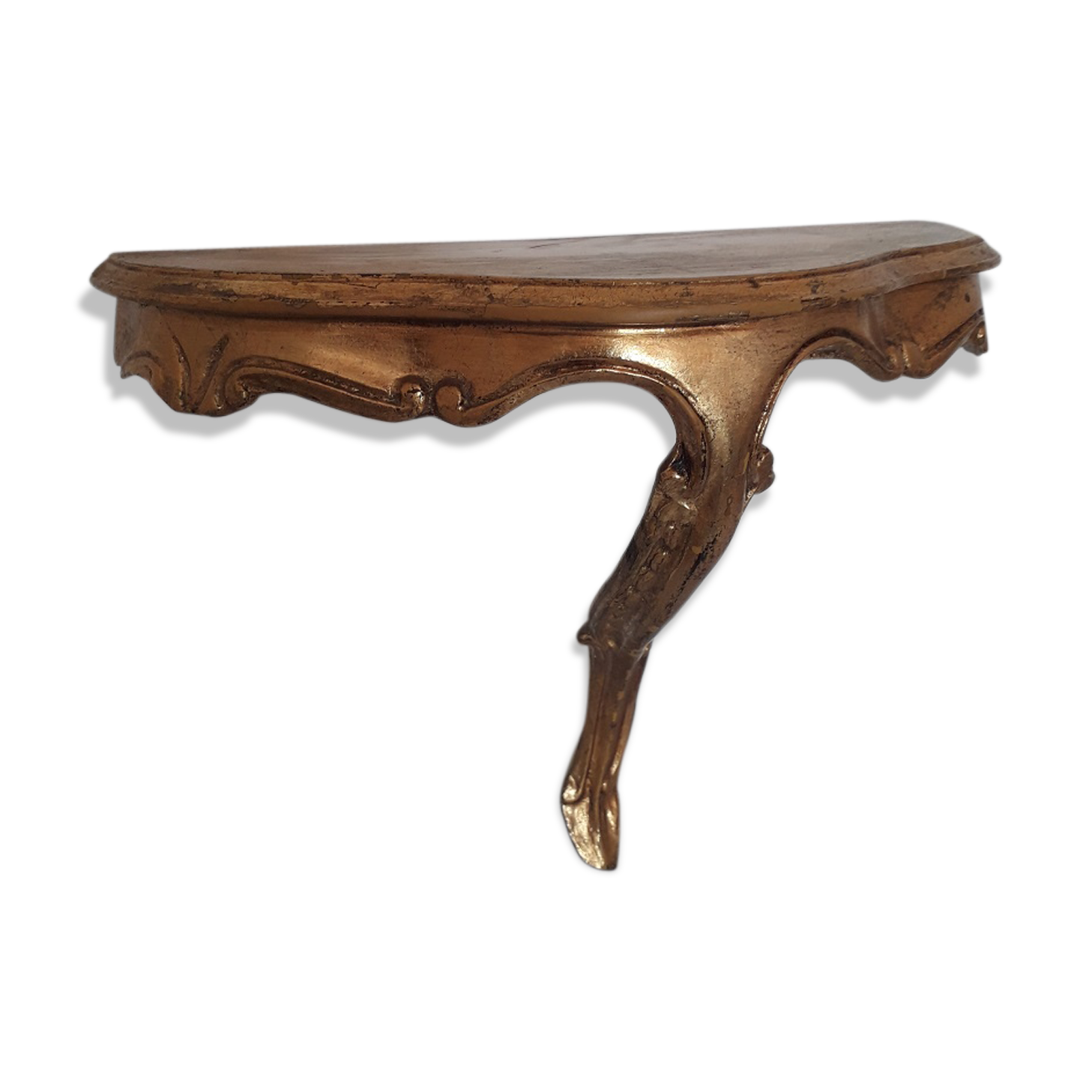 Wall shelf in gilded wood