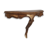 Wall shelf in gilded wood