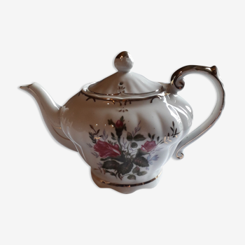 Musical teapot in white porcelain with floral decoration