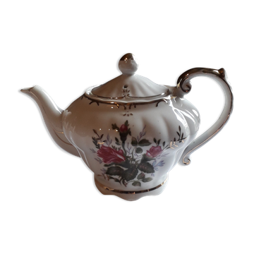 Musical teapot in white porcelain with floral decoration