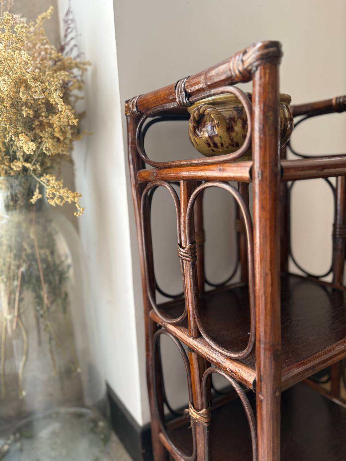 Dark brown 70s bamboo and cane shelf on legs